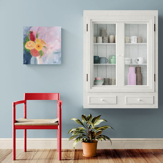 Original mixed media art by Little Haven Art Studio depicting vibrant flowers in vase on blue wall above red chair next to display cabinet.
