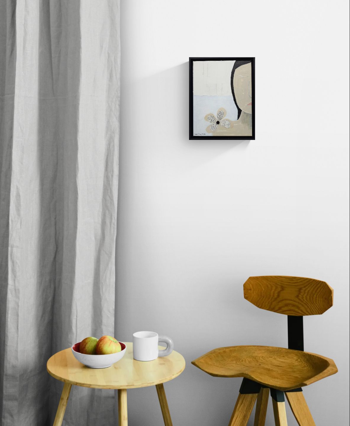 Original mixed media wall art, titled "Guilt" in the Beauty for Ashes series by Little Haven Art Studio, depicting half of a face displaying guilty feelings, with flower collage and plaster elements, hanging above wood table and chair.