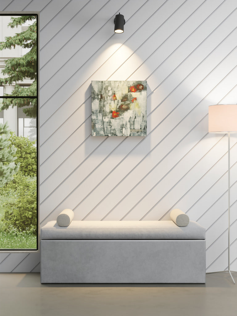 The Flowers Fade original mixed media wall art of abstract red and yellow flowers on gray and white background by Amanda Craig of Little Haven Art Studio, hanging above bench seat.