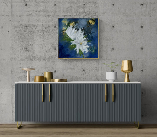 "Magnify Together" by Little Haven Art Studio hanging on concrete wall above gray art deco cabinet with gold metal accents.