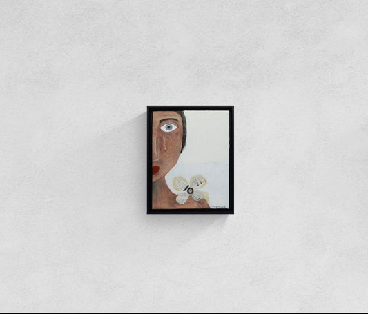 Original mixed media wall art, titled "Sadness" in the Beauty for Ashes series by Little Haven Art Studio, depicting half of a face displaying sad feelings with a tear, with flower collage and plaster elements. 