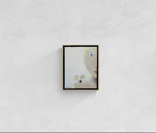 Original mixed media wall art, titled "Shock" in the Beauty for Ashes series by Little Haven Art Studio, depicting half of a face displaying feelings of shock in grief, with flower collage and plaster elements. 