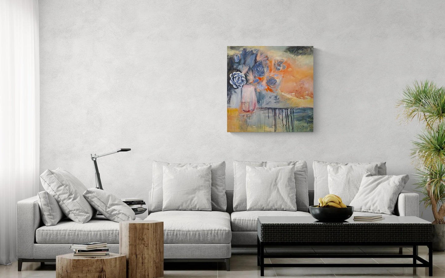 "Finding Joy" bright wall art in blue, orange, red, teal, and pink, above white sofa by Amanda Craig of Little Haven Art Studio.