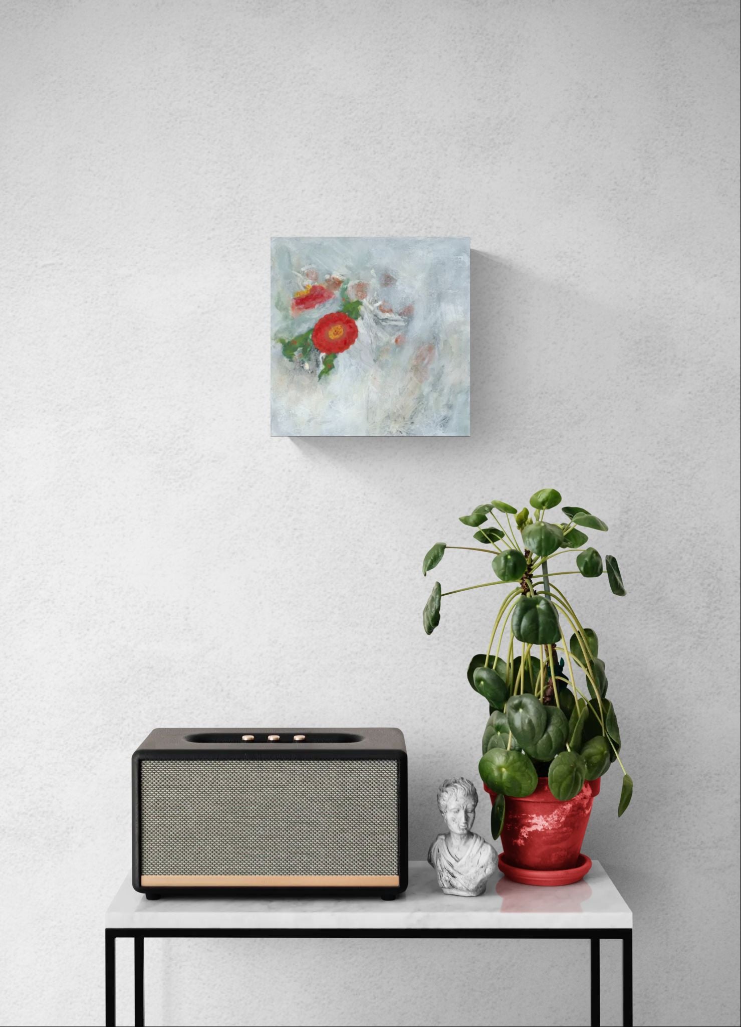 Dreamy original abstract impressionism red floral wall art of "It Is Well" by Little Haven Art Studio in red, gold, green, and white hanging in hallway above radio and plant sitting on table.