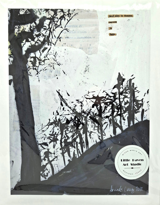 Print of abstract landscape, titled "Land Seen in Dreams" by Little Haven Art Studio, in black and white of pine trees on a hill.