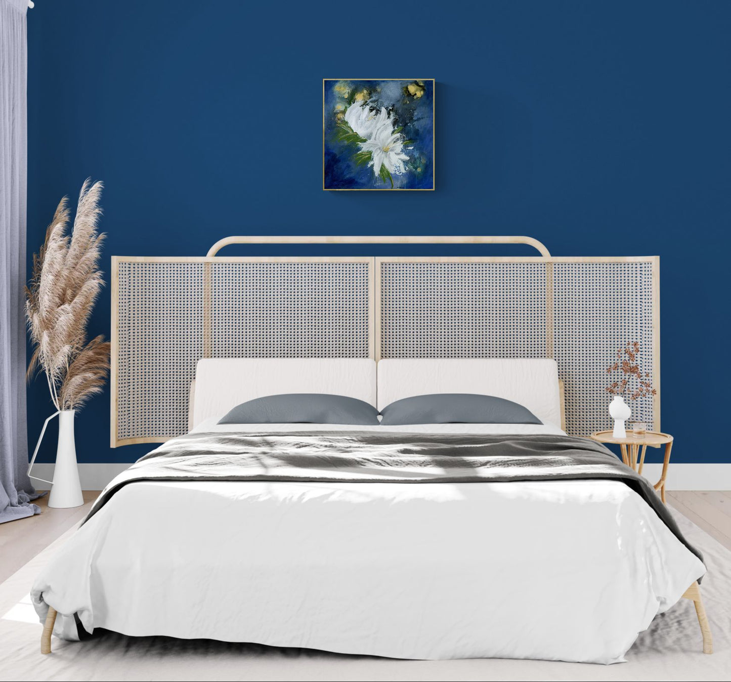 Original floral mixed media painting "Magnify Together," by Amanda Craig of Little Haven Art Studio, hanging on blue wall in boho style bedroom.