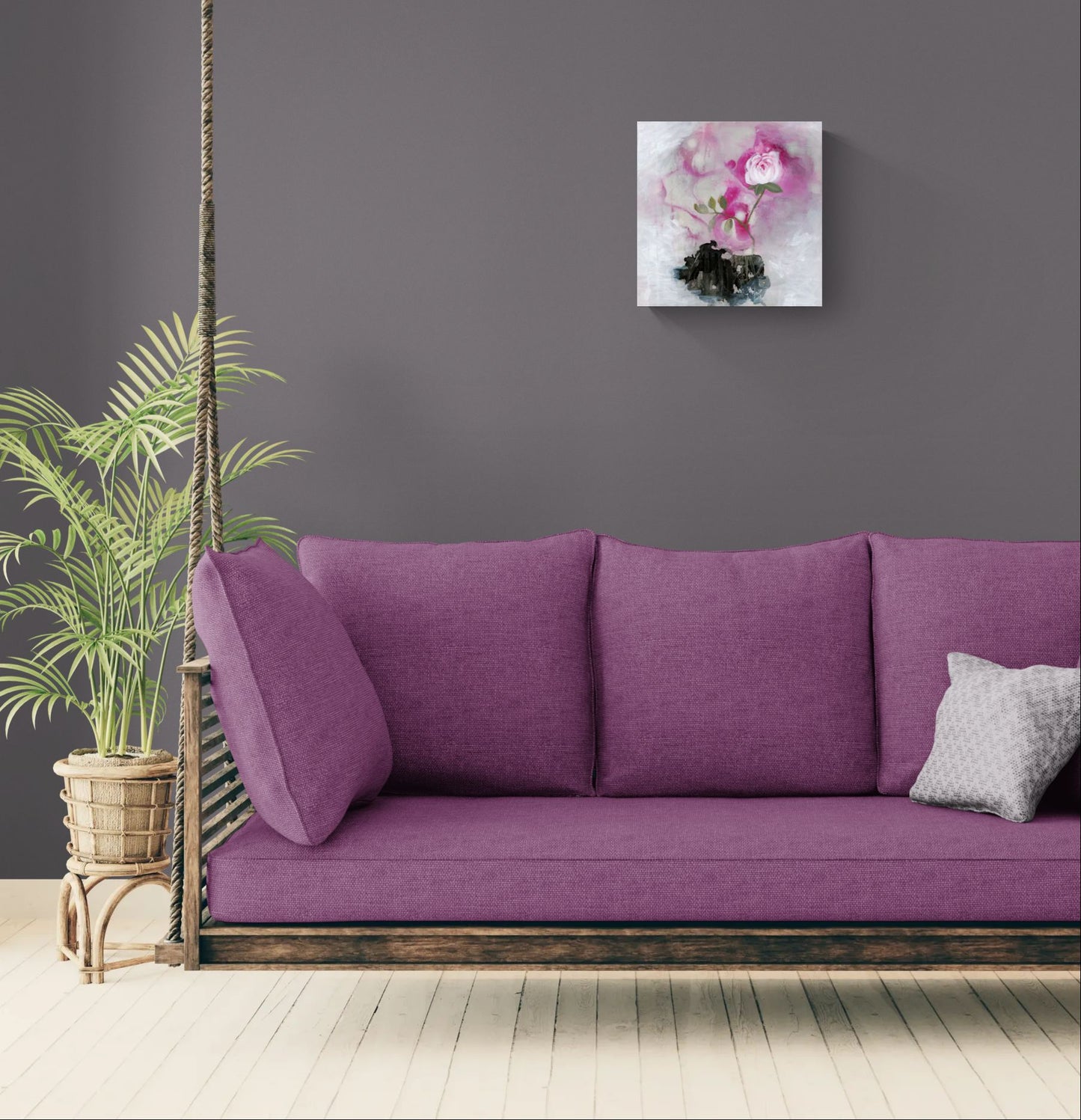 "Sanctuary Bloom" abstract impressionism canvas wall art of a pink rose with green leaves on a textured white and black background by Little Haven Art Studio in minimalistic living room above magenta hanging sofa.