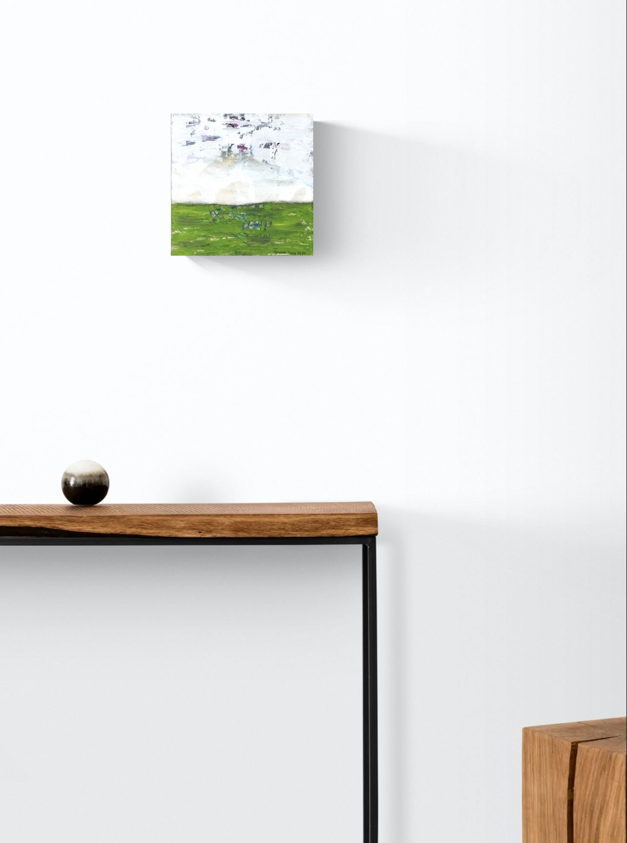 "Searching for Something" original abstract canvas wall art in green and white, by Amanda Craig of Little Haven Art Studio hanging above wood console table.