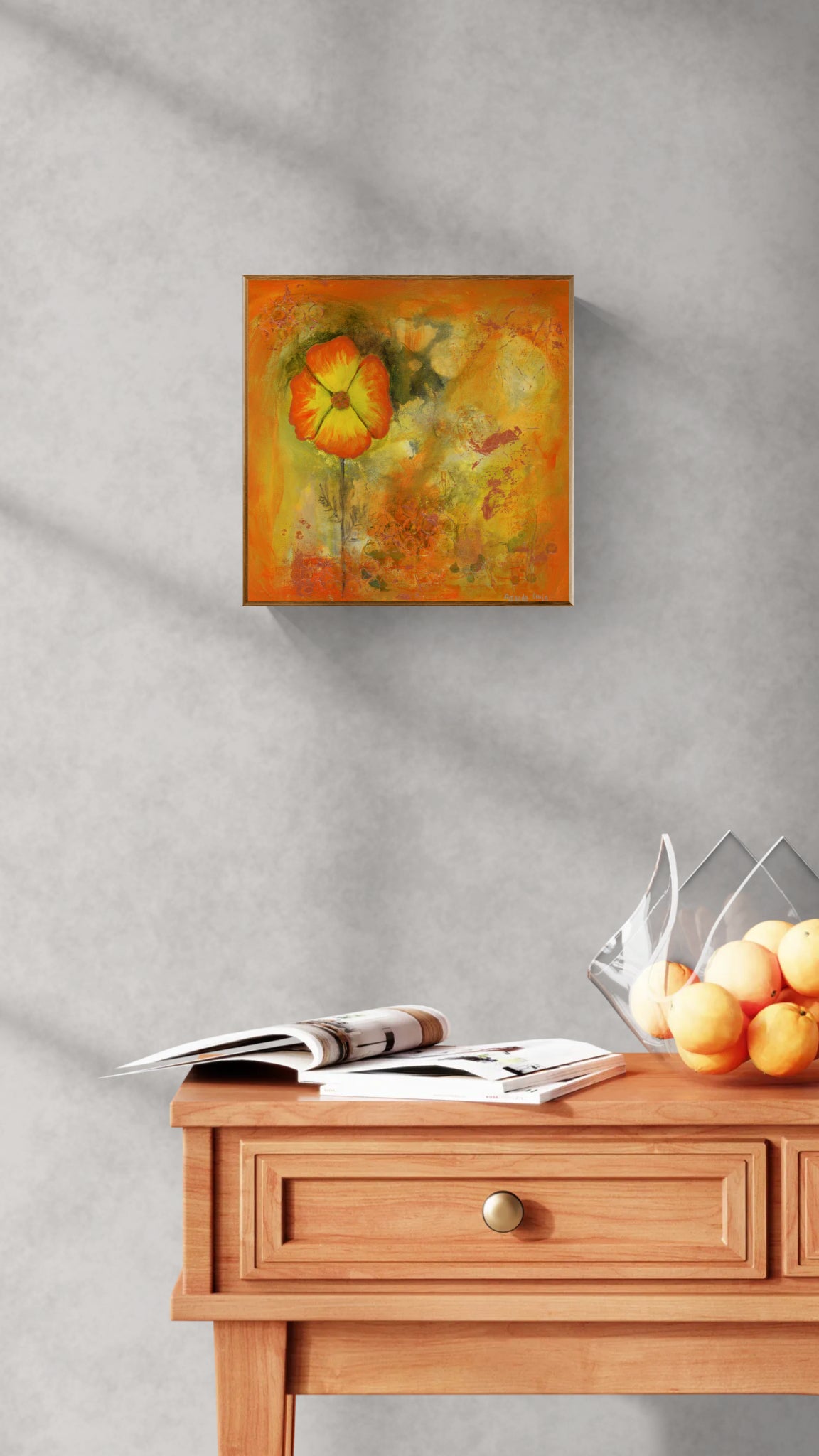 Original floral mixed media painting on abstract background titled, "Seek Him," by Amanda Craig of Little Haven Art Studio, in orange and fire opal tones with highlights of metallic copper with a copper tone floating frame hanging above a wood side table.
