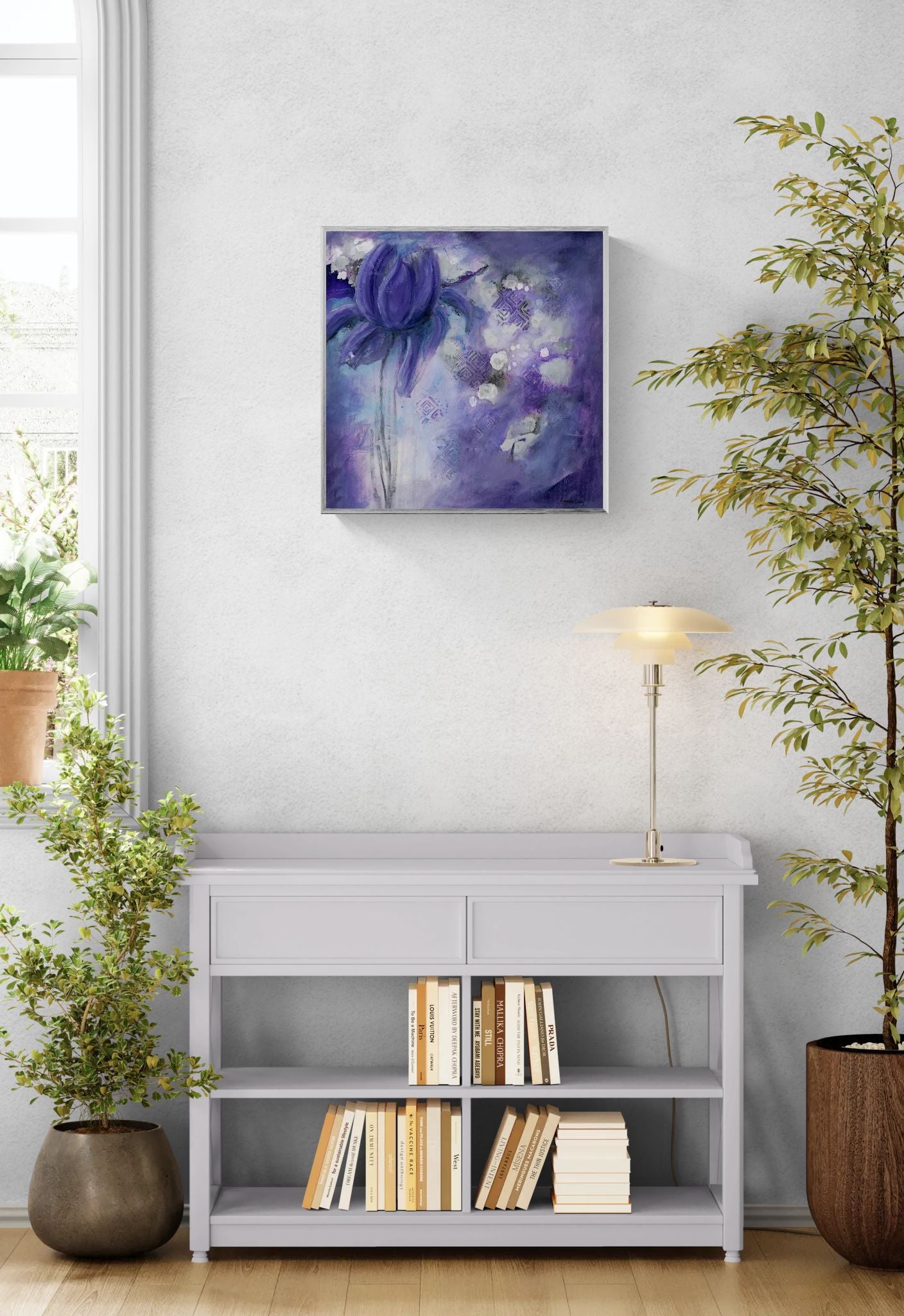 Original floral mixed media painting on abstract background titled, "Sovereignty," by Amanda Craig of Little Haven Art Studio, in amethyst purple, grey, white, and metallic silver, with silver tone floating frame hanging on wall above gray cabinet with books.