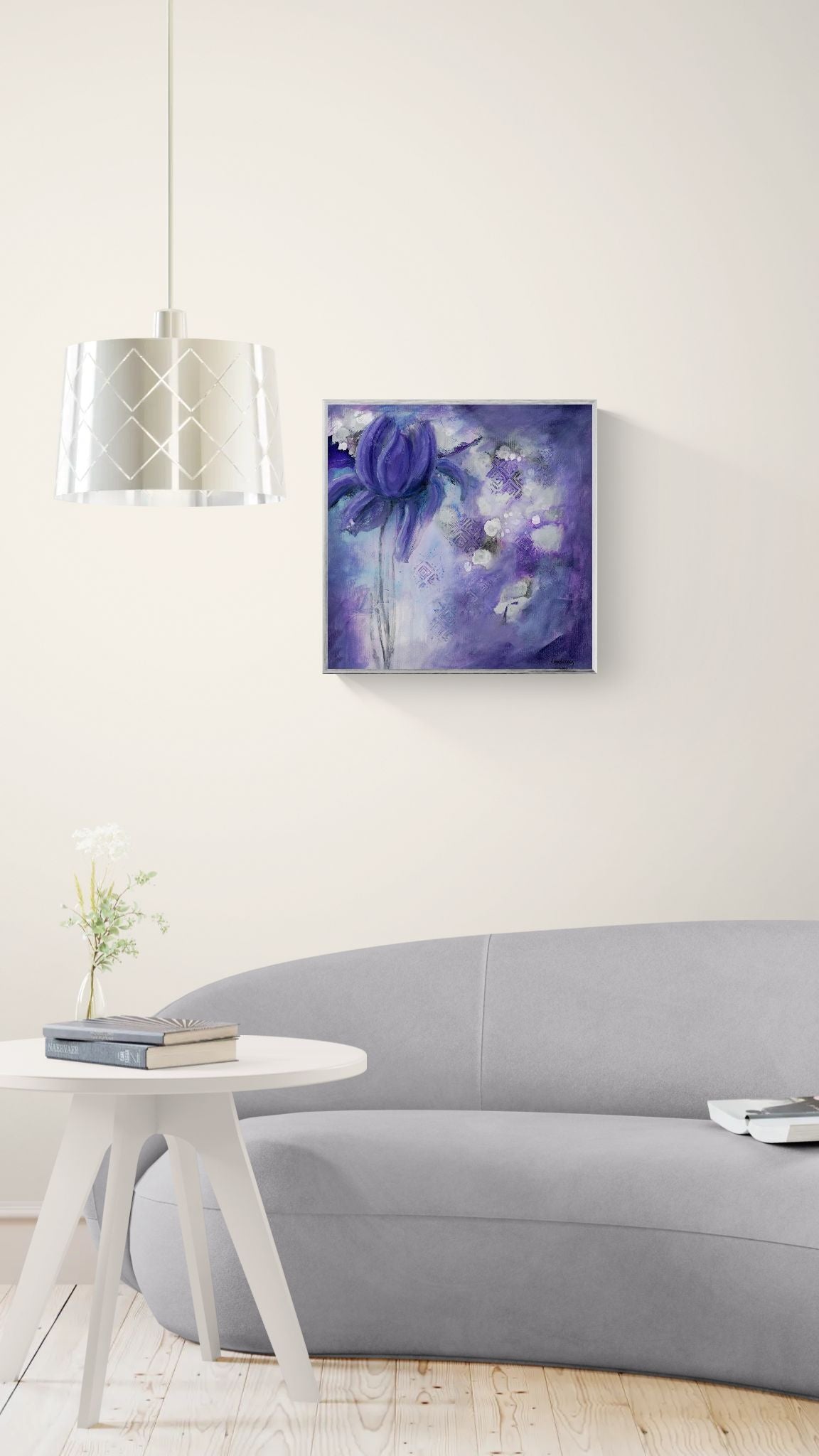 Original floral mixed media painting on abstract background titled, "Sovereignty," by Amanda Craig of Little Haven Art Studio, in amethyst purple, grey, white, and metallic silver, with silver tone floating frame hanging on wall above gray curved sofa.