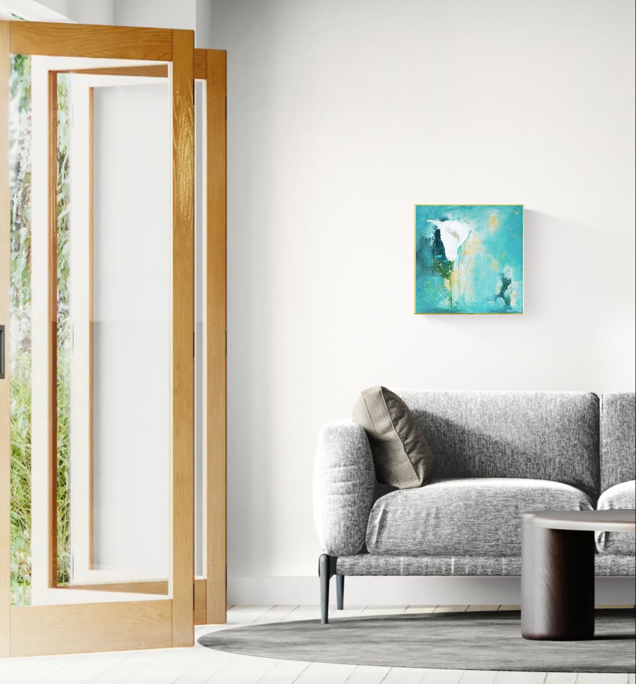 Original floral mixed media painting on abstract background titled, "Steadfast," by Amanda Craig of Little Haven Art Studio, in teal, white, green, and metallic gold, with gold tone floating frame hanging in living room above gray sofa next to open bifold doors.