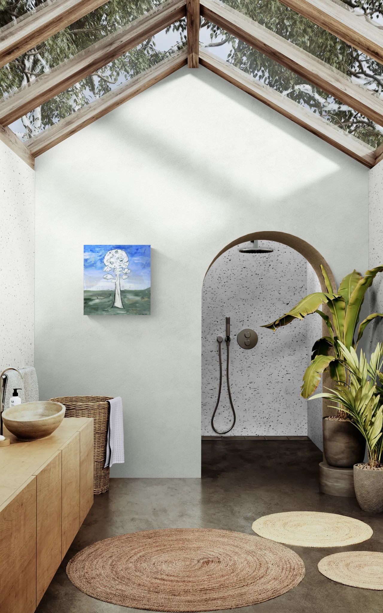 Original mixed media wall art, titled "Struggling for Space" by Little Haven Art Studio, of an ashy tree with a backdrop of blue sky and green grass in modern bathroom with glass roof.