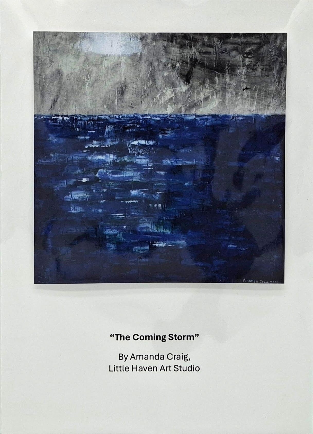 Card with print image of abstract ocean landscape, titled "The Coming Storm," with blue and gray tones and storm approaching, by Little Haven Art Studio.