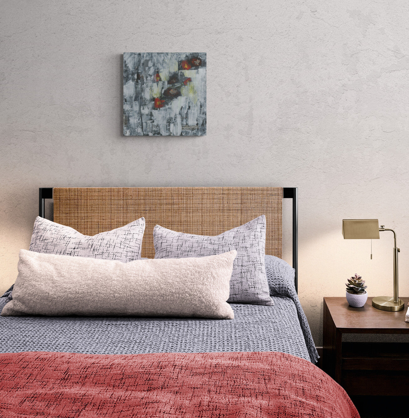 Original mixed media art of abstract red and yellow flowers on gray and white background in bedroom by Amanda Craig.